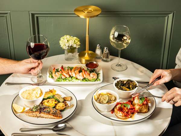 Dinner menu with grilled salmon and Tuscan chicken