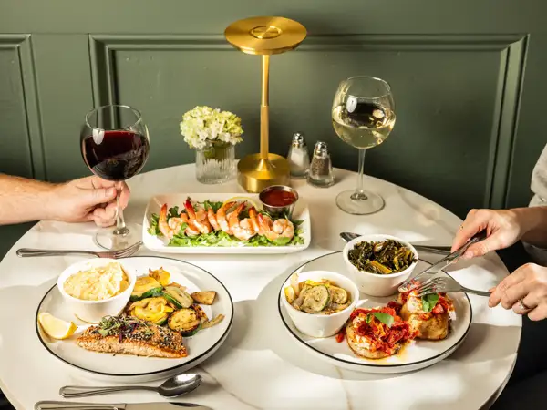 Dinner menu with grilled salmon and Tuscan chicken